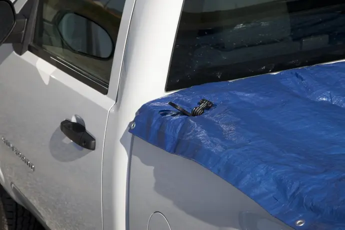 3in1 truck tie being used with a tarp